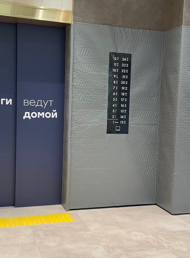 Брендированная защита лифтовой кабины с логотипом девелопера — Коверлифт